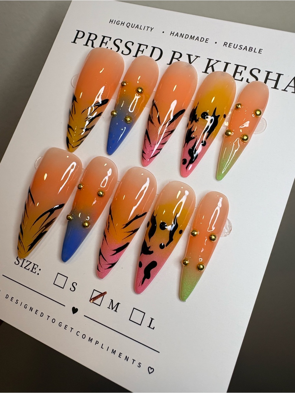 Stiletto Nail Set in Orange Gradient with Multicolor Tips
